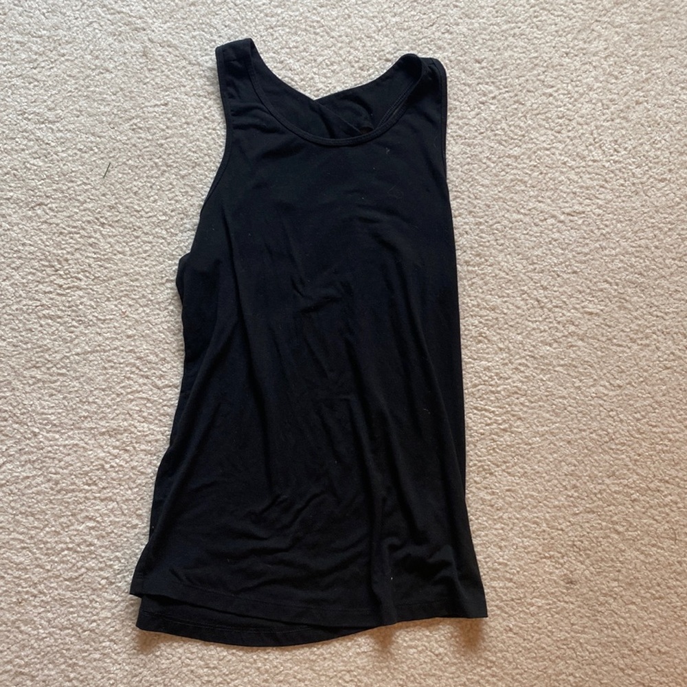 black workout tank with crisscross detail in back